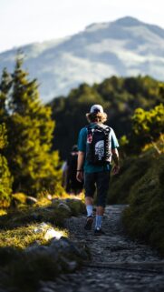 Hiker Trekking Through Mountains High Quality Phone Wallpaper