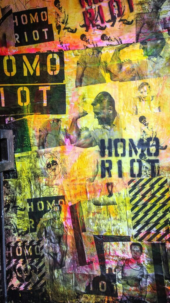 Vibrant Homo Riot Urban Street Art Collage Aesthetic Mobile Wallpaper