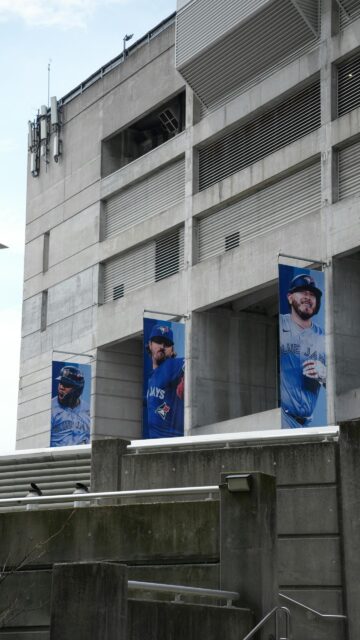 Toronto Blue Jays Stadium Banners featuring Baseball Players Wallpaper