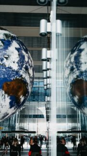 Stunning Earth Globe Reflection in Modern Architecture Wallpaper