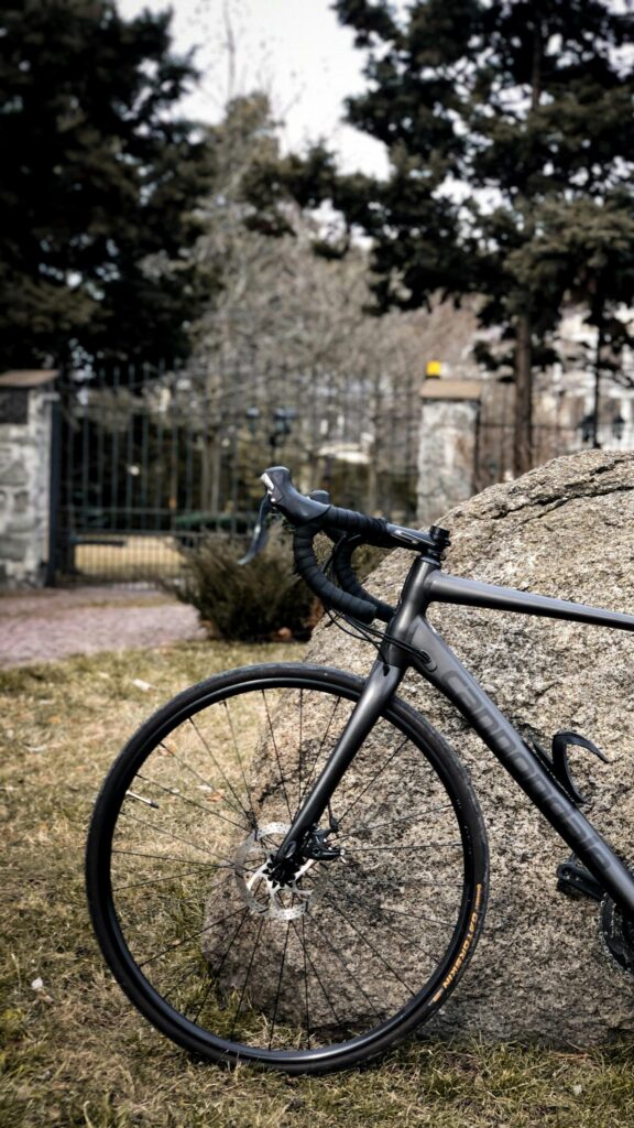 Minimalist Black Cannondale Road Bike Against Boulder Wallpaper