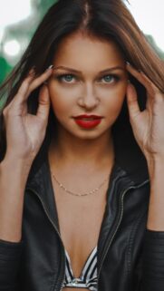 Stunning Portrait of a Beautiful Woman in Leather Jacket Wallpaper