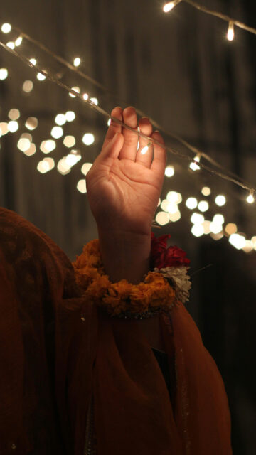 Radiant Energy Hand with Glowing Light Chakra Manifestation Wallpaper