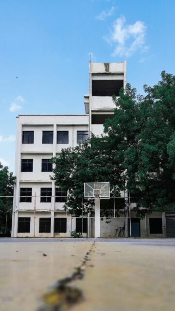 Aesthetic Basketball Court and Building Exterior Mobile Wallpaper