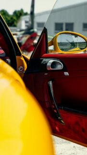 Stunning Yellow Porsche Interior with Red Leather Accents Wallpaper