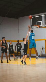 Intense Basketball Jump Shot Action Sports Mobile Wallpaper