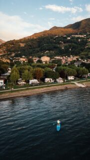 Stunning Lake Como Paddleboard Adventure Aerial View Mobile Wallpaper