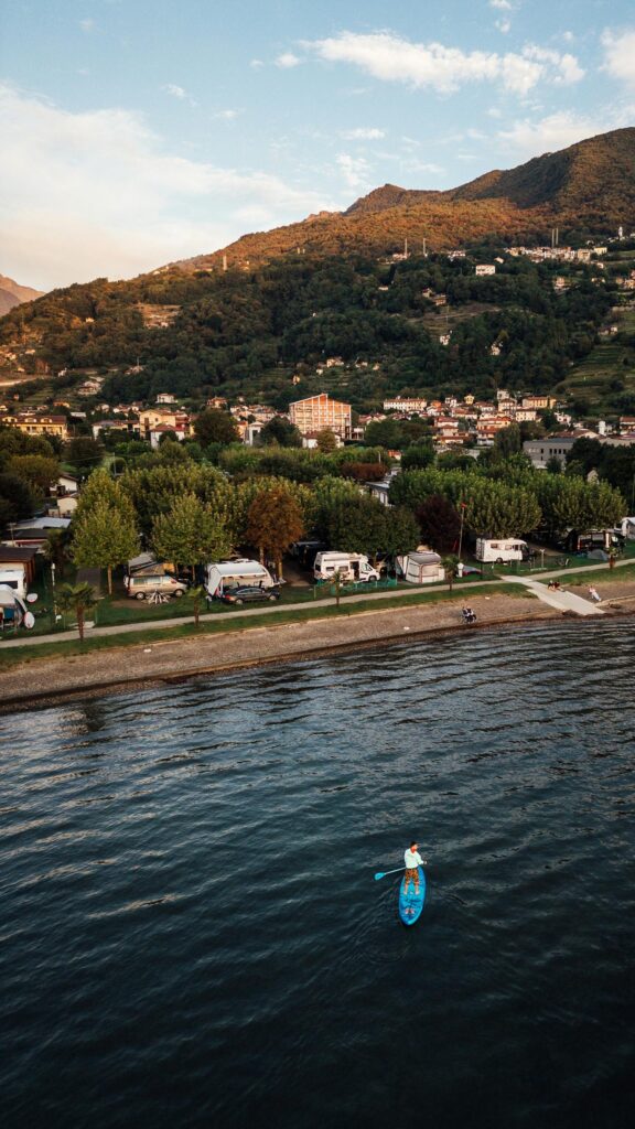 Stunning Lake Como Paddleboard Adventure Aerial View Mobile Wallpaper