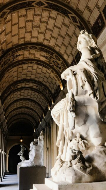 Elegant Marble Sculpture Hallway Architecture 4K Phone Wallpaper