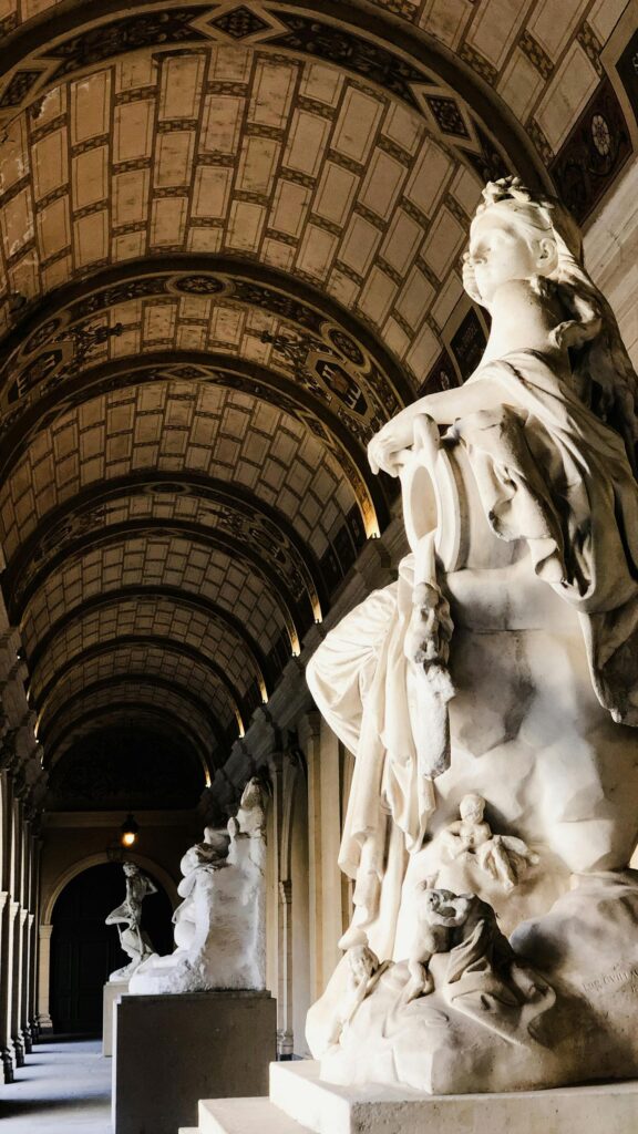 Elegant Marble Sculpture Hallway Architecture 4K Phone Wallpaper