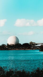 Iconic Spaceship Earth Epcot Center Scenic Lake View Mobile Wallpaper