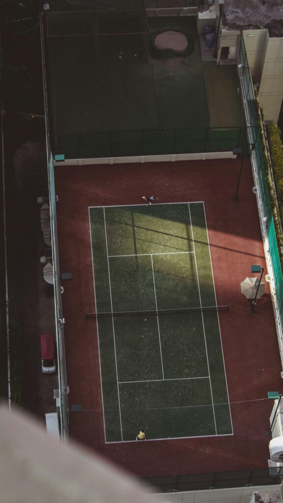 Aerial View of an Outdoor Tennis Court High Resolution Mobile Wallpaper