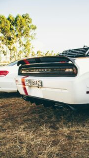 White Dodge Challenger SRT Rear View with Racing Stripes Mobile Wallpaper