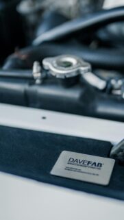 Close-up Car Engine Bay with Davefab Badge 4K Phone Wallpaper