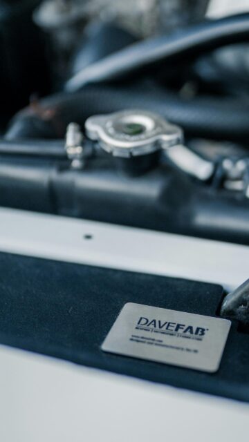 Close-up Car Engine Bay with Davefab Badge 4K Phone Wallpaper