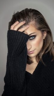 Stunning Brunette Woman with Smoky Eye Makeup Mobile Wallpaper