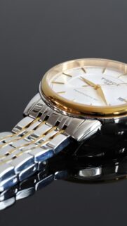 Elegant Tissot Powermatic 80 Gold and Silver Luxury Watch Wallpaper