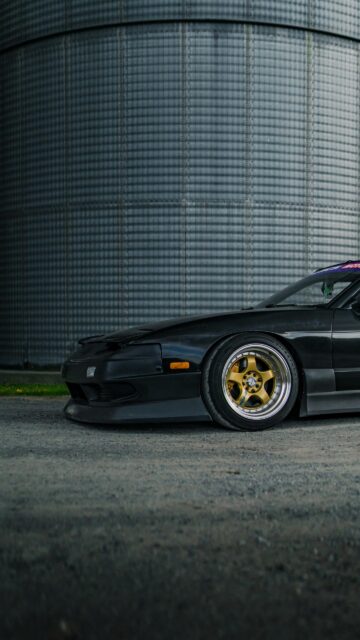 Aggressive Black JDM Nissan 240SX with Gold Wheels Mobile Wallpaper