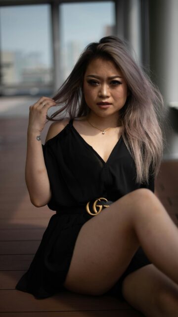 Stylish Asian Woman in Black Dress Fashion Portrait Wallpaper