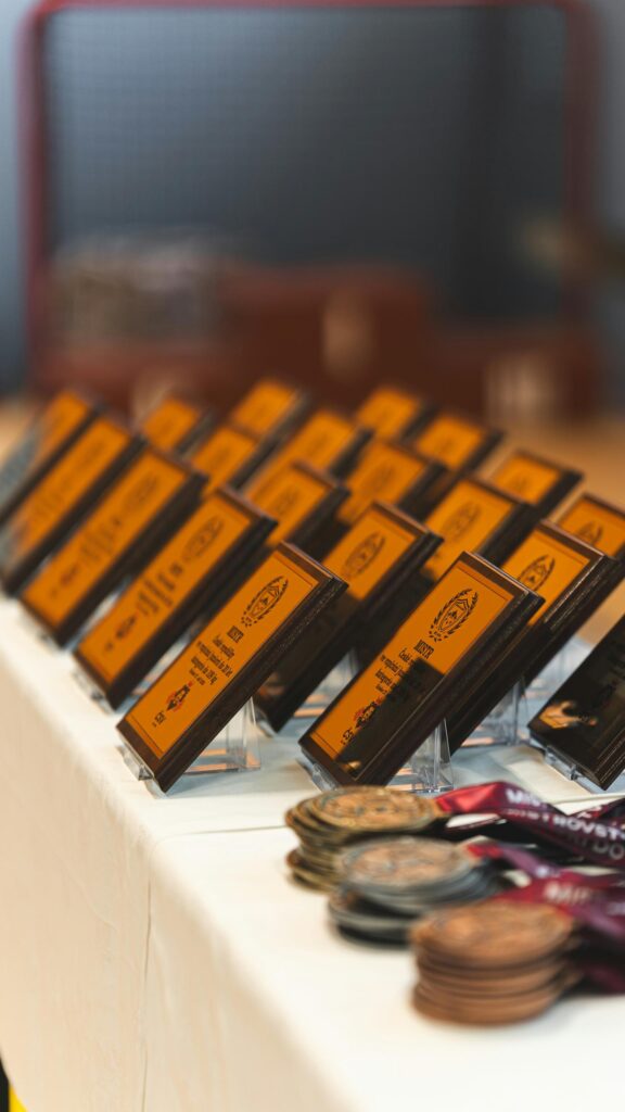 Trophy Plaques and Winning Medals Sports Achievement Wallpaper