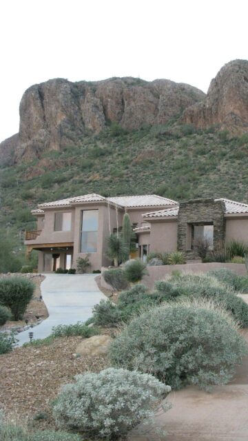 Stunning Desert Luxury Home Nestled Under Mountain Peaks Mobile Wallpaper