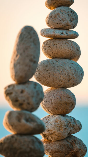 Zen Stone Stacking Balance and Mindful Grounding Spiritual Wallpaper