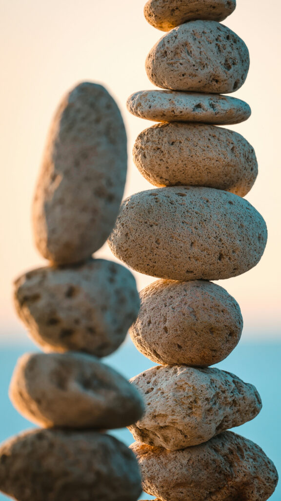 Zen Stone Stacking Balance and Mindful Grounding Spiritual Wallpaper