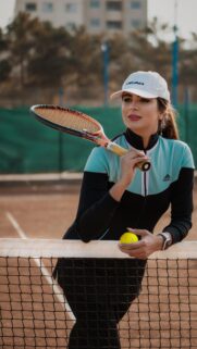 Beautiful Tennis Player Girl with Racket and Ball Mobile Wallpaper