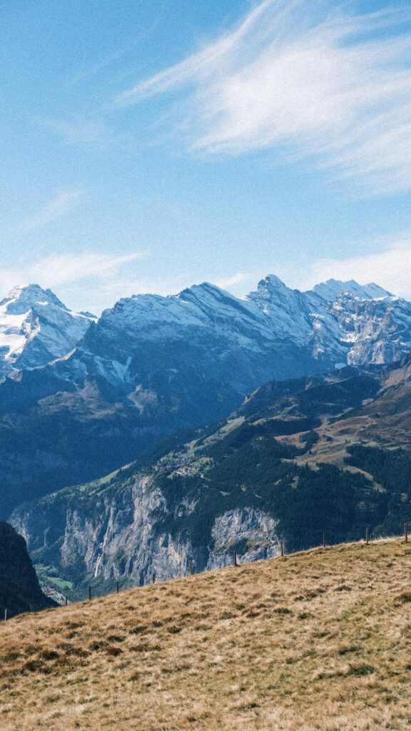 Breathtaking Swiss Alps Snowy Peaks Mountain View Mobile Wallpaper