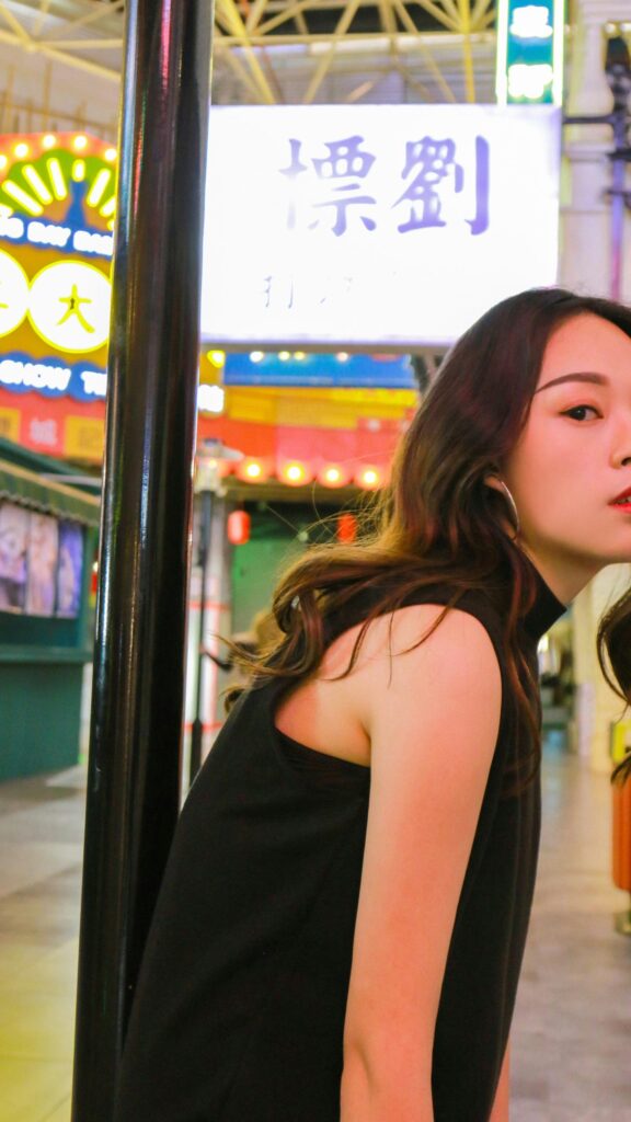Stunning Asian Woman in Stylish Black Outfit Urban Night Portrait Wallpaper