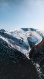 Stunning Snowy Mountain Peak Winter Scenery Mobile Wallpaper