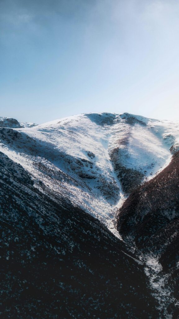 Stunning Snowy Mountain Peak Winter Scenery Mobile Wallpaper