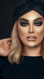Stunning Blonde Woman with Glitter Green Eyes Makeup Phone Wallpaper