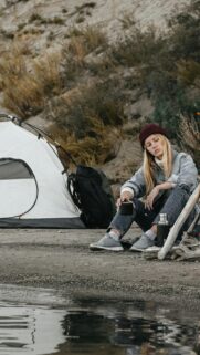 Solo Camping Girl with Coffee by the Lake Scenic Nature Mobile Wallpaper