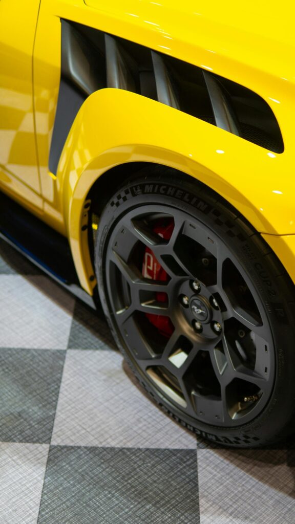 Yellow Ford Mustang Shelby GT500 Sports Car Close-Up Mobile Wallpaper