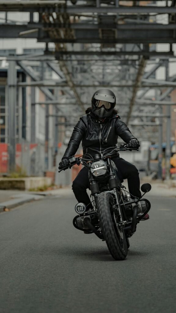 Edgy Biker Riding Custom Vintage Motorcycle Street Wallpaper