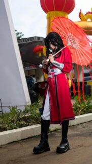 Cosplay Anime Warrior with Red Umbrella and Traditional Outfit Wallpaper