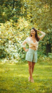 Smiling Woman in Light Summer Outfit Natural Park Portrait Wallpaper
