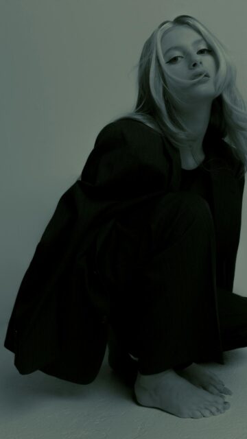 Chic Woman in Black Suit Aesthetic Portrait Mobile Wallpaper