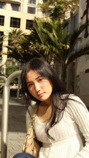Stunning Asian Woman in Cream Cardigan Sunny Urban Street Style Wallpaper