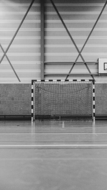 Minimalist Indoor Handball Goal Court Black and White Wallpaper
