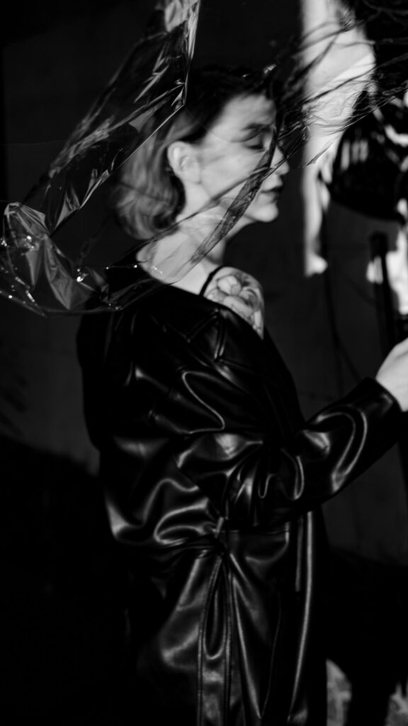 Edgy Monochrome Portrait with Plastic Texture Aesthetic Phone Wallpaper