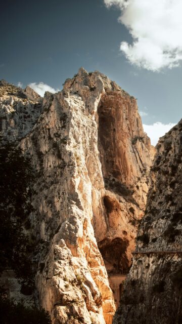 Dramatic Limestone Canyon Cliffside Adventure Phone Wallpaper