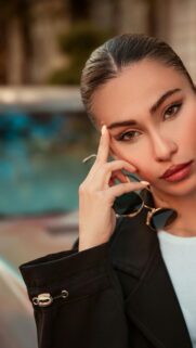 Stunning Portrait of Elegant Woman with Sunglasses Premium Mobile Wallpaper