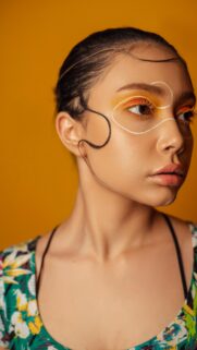 Artistic Portrait of Woman with Creative Graphic Makeup Wallpaper