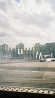 Drifting Sports Cars on Racetrack Asphalt Action Wallpaper