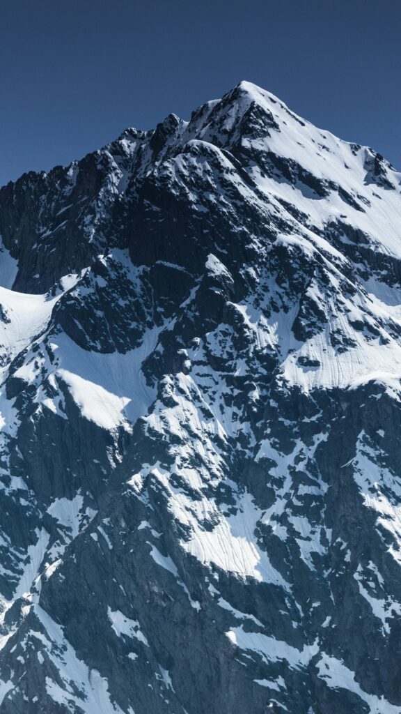 Snow-Covered Mountain Peak Winter Landscape Phone Wallpaper
