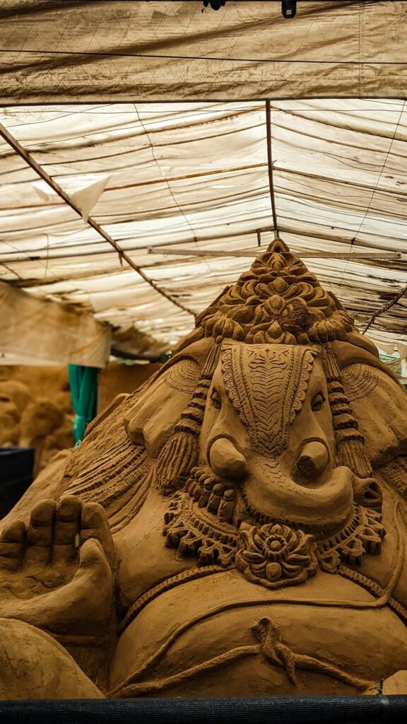 Majestic Sand Sculpted Lord Ganesha Art Mobile Wallpaper