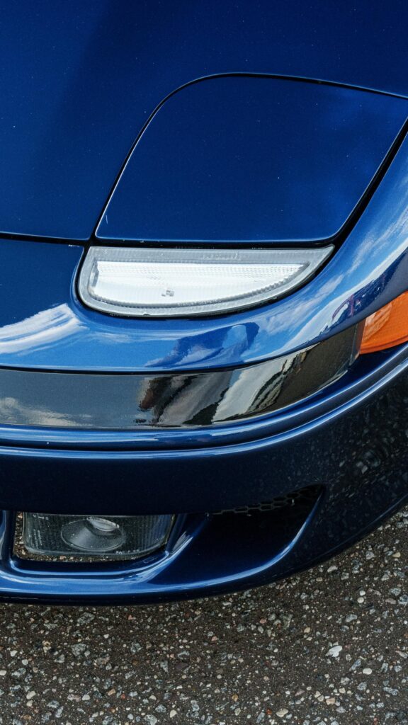 Close-up Blue Sports Car Front End Aesthetic Mobile Wallpaper