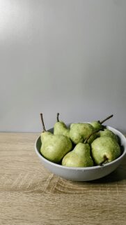 Fresh Green Pears in a Minimalist Bowl Mobile Phone Wallpaper
